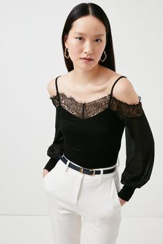 The Bardot Top Is An Ever-Stylish Wardrobe Staple That Has Versatility At Its Core. With Long Chiffon Georgette Sleeves, It'S Trimmed With Lace Across The Neckline, Taking The Piece From Daytime To Evening. Finished With Spaghetti Straps On The Shoulder, Tuck This Piece Into High Waisted Trousers Or A Skirt For Endless Outfitting Potential. Bardot Top Outfit, Bardot Top, Stylish Wardrobe, Latest Tops, Karen Millen, Jersey Top, Top Collection, High Waisted Trousers, Fashion Face