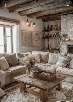 a living room filled with furniture and a fire place