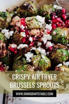 brussel sprouts with onions and pomegranate in a bowl