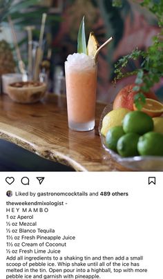 the menu for an alcoholic cocktail is displayed on a wooden table with limes, oranges and watermelon