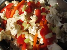 the vegetables are mixed together in a colander