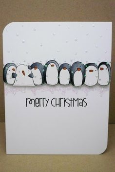 a christmas card with five penguins on it