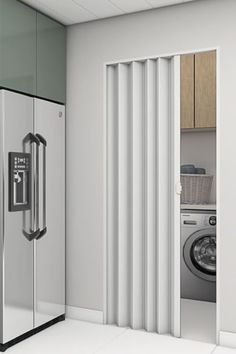 a white refrigerator freezer sitting next to a washer and dryer in a kitchen