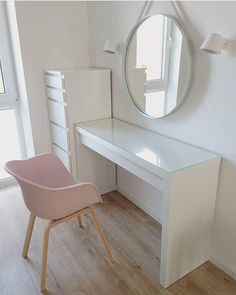 a white desk with a mirror and chair in front of it on the instagram page