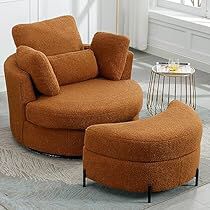 an orange chair and ottoman in a living room