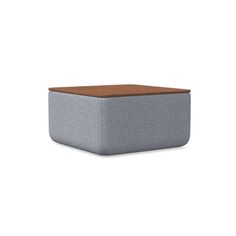 the cube ottoman in grey linen and walnut wood is shown on an isolated white background