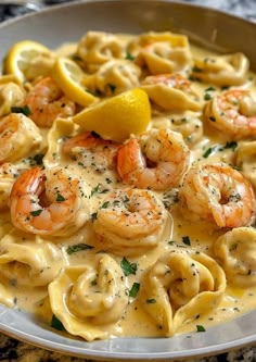 pasta with shrimp and lemon sauce in a bowl