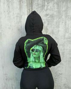 the back of a woman's black hoodie with an image of marilyn monroe on it