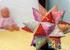 a close up of a colorful pinwheel on a table