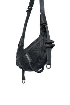 a black leather shoulder bag on a white background with clippings to the side