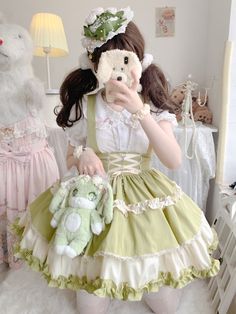 This stunning Lolita skirt features a charming green and white color scheme, accentuated by a lace-up front and a high waist design for a flattering fit. The detachable straps add a versatile touch, allowing you to customize your look. Embrace the sweet and elegant Lolita style with this beautiful skirt that is perfect for any occasion.   	 		 			Size 			S 			M 			L 		 		 			Waist 			58-82 			64-88 			72-94 		 		 			Full Length 			43 			44 			45 		 		 			Hem Circumference 			426 			426 			426 Spring Green Bottoms With Lace Trim, Summer Green Skirt With Lace Trim, Green Ruffled Dress With Skirt Shape, Green Mini Skirt With Ruffles, Violet Brown, Strap Skirt, Steampunk Fashion Male, Gothic Skirts, Fashion Bottoms