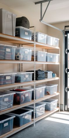 the shelves are filled with plastic containers and boxes