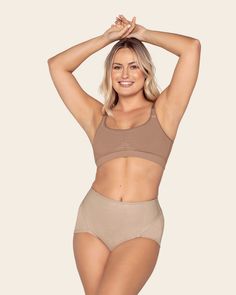 This classic postpartum girdle comfortably compresses your mid-to-lower tummy. Its front panel is made of double-layered PowerSlim® fabric for firm compression. Adjustable Velcro sides allow you to find your perfect fit and choose your own compression level. The stretchy waistband and leg bands are covered for a comfortable fit without panty lines. With no hooks or zippers, this is the ideal panty to wear as you get back into shape, while protecting your c-section incision or recovering from a n Compression Moisture-wicking High-waisted Shorts, Black Moisture-wicking Compression Bottoms, Stretch Low-cut Nursing Bra With Removable Pads, Postpartum Girdle, High-waisted Compression Shapewear Shorts, Cotton Compression Bottoms Multi-pack, Natural Delivery, Shaper Panty, Belly Wrap