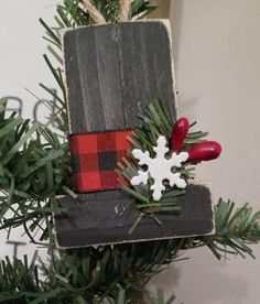 a christmas ornament hanging from a tree