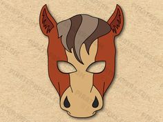 a horse mask with hair on it's head is shown in brown and tan