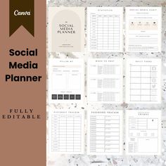 the social media planner is displayed on a marble surface