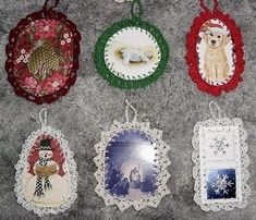 there are many christmas ornaments hanging on the wall in front of each other, including one with an ornament and another with a polar bear