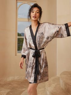 Crafted with meticulous attention to detail, our kimono robe embodies the essence of Eastern luxury, offering you a truly indulgent experience every time you slip it on. Its versatile design effortlessly transitions from leisurely mornings to elegant evenings, ensuring you stay elegant and refined throughout the day. • Silky Comfort: Made of high-quality polyester charmeuse, our short robes are soft, lightweight and cooling for summer. They have a smooth and breathable texture that feels just li Elegant Wrap Kimono For Home, Elegant Wrap Robe For Relaxation, Elegant Kimono With Kimono Sleeves For Home, Short Kimono Robe, Satin Kimono, Short Kimono, Womens Kimono, Floral Kimono, Silk Shorts