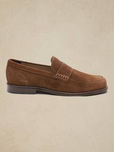 A timeless penny loafer, this sumptuously soft suede shoe preserves the traditional look with the signature penny slot across the vamp, updated here in a more modern shape.  Designed with lightweight, durable OrthoLite® performance insoles for breat Cheap Suede Slip-on Loafers, Medium Width Suede Slip-on Loafers, Brown Slip-on Loafers With Goodyear Welt Construction, Rugged Brown Slip-on Loafers, Brown Loafers With Rubber Sole, Medium Width, The Vamps, Penny Loafers, Brown Suede, Suede Shoes