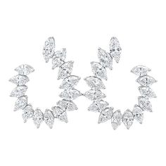 Stunning illusion set diamond cluster earrings diamonds, by Alexander Beverly Hills.  28 marquise brilliant diamonds, 7.71 carats total. Approximately D-F color and VS clarity. 6.95 grams, 18-karat white gold, 1x1in. Accommodated with an up-to-date digital appraisal by a GIA G.G. once purchased, upon request. Please contact us with any questions. Bvlgari Gold, Earrings Diamonds, Cartier Gold, Yellow Diamonds Engagement, Yellow Diamond Engagement Ring, Diamond Cluster Earrings, Yellow Diamond Rings, Fancy Yellow Diamond, Diamond Necklace Set