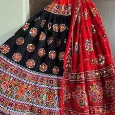 Dandiya Outfit with Ghagra Choli Set Traditional Multicolor Sharara With Motifs, Traditional Multicolor Motif Sharara, Traditional Sharara With Multicolor Embroidery And Motifs, Traditional Multicolor Embroidered Sharara With Motifs, Traditional Sharara For Navratri, Traditional Sharara With Mirror Work, Transitional Festival Choli With Pallu, Bohemian Sharara With Mirror Work For Festivals, Traditional Festival Anarkali Set With Motifs