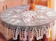 a white doily on a table in a kitchen