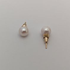 These earrings, featuring cultured saltwater Akoya pearls set in 14K yellow gold, provide a classic and timeless style that enhances any outfit. The round pearls measure 7.5-8.0mm in size, displaying a stunning luster and a bright white color that's beautifully amplified by their natural orient. Set in a versatile stud style, the earrings are suitable for both everyday wear and special occasions. With a lightweight design, they ensure comfort throughout the day. The pearls' clean surface, free f Classic Pearl Earrings In Yellow Gold, Classic Yellow Gold Round Pearl Earrings, Classic Round Yellow Gold Pearl Earrings, Classic Hypoallergenic Yellow Gold Pearl Earrings, Classic Gold Akoya Pearl Earrings, Classic Akoya Pearl Earrings, Classic Yellow Gold Pearl Earrings With High Luster, Classic Yellow Gold Pearl Earrings, Classic Pearl White Pearl Earrings With Round Beads