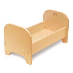 a wooden toddler's bed sitting on top of a white floor