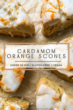 orange scones with white icing and orange sprinkles