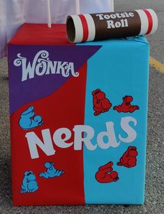 a cardboard box that has some kind of candy on it's side, with the word nerds printed on it