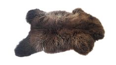 a brown and black animal skin rug on a white background for use as a floor mat