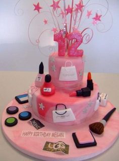 a pink birthday cake decorated with makeup and accessories on a table top, in the shape of a shopping bag