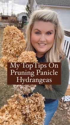 a woman holding up some dried flowers in her hands with the words my top tips on pruning panice hydrangeas