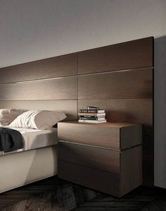 a bedroom with a bed, night stand and nightstand