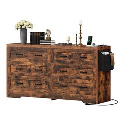 a wooden dresser with drawers and books on top