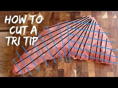 how to cut a strip of meat on a cutting board with blue lines in the middle