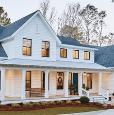 a large white house with lots of windows