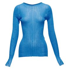 CELINE Phoebe Philo blue semi sheer viscose bateau neck ribbed sweater L Reference: CNPG/A00059 Brand: Celine Designer: Phoebe Philo Material: Viscose Color: Blue Pattern: Solid Closure: Pullover Made in: Italy CONDITION: Condition: Very good, this item was pre-owned and is in very good condition. Please refer to image gallery for thorough condition check. Minor dent at back hem. Comes with: Style code present (Generic) SIZING Designer size: L Size reference: US8 / UK12 / IT44 / FR40 / M-L MEASU Celine Sweater Outfit, Celine By Phoebe Philo, Celine Knitwear, Luxury Blue Knit Top, Luxury Blue V-neck Sweater, Bateau Neck, Phoebe Philo, Issey Miyake, Ribbed Sweater