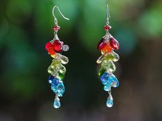 "THE JEWELRY IS SHIPPED via DHL EXPRESS (2-5 days delivery door to door). THE DHL SHIPPING COST IS INCLUDED IN THE PRICE. The Story Earrings - Multi Gemstone Rainbow Earrings, Long Gemstone Cluster Earrings in Sterling Silver ► Measurements / Details: - Length including earwire: 2.56\" (~6.5 cm) * can be made longer/shorter per request - Silver: High quality Sterling Silver - Gold: High quality 14K Gold Filled ► Gemstones: The earrings include excellent AAA quality gemstones, they are natural, s Dangle Multi-stone Earrings For Gifts, Multicolor Gemstone Accent Fusion Earrings, Multicolor Drop Earrings, Fusion Style Teardrop Multi-stone Earrings, Multicolor Dangle Earrings With Gemstone Accents, Fusion Style Multi-stone Teardrop Earrings, Multicolor Multi-stone Drop Jewelry, Multicolor Briolette Multi-stone Earrings, Multicolor Multi-stone Briolette Earrings