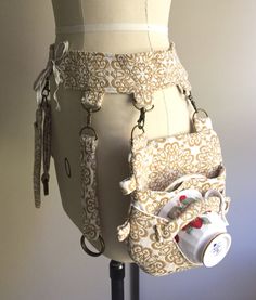 Steamtorium Undercorset Belt and Teacup Holster (Steampunk Project and Pattern Review) | Fresh Frippery Steampunk Utility Belt, Teacup Holster, Steam Punk Diy, Steampunk Belt, Mode Steampunk, Steampunk Crafts, Diy Kostüm, Style Steampunk, Steampunk Cosplay