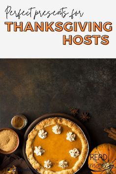 a thanksgiving pie with pumpkins and spices around it