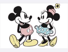 two mickey and minnie mouses dancing together with their arms in the air, one pointing at