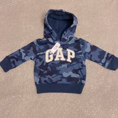 Nwt Gap Factory Blue Camo Pullover Hoodie Size 12-18m Blue Winter Sweatshirt For Playtime, Adjustable Hood Hoodie For Playtime In Fall, Blue Cotton Hoodie For Playtime, Blue Hooded Top For Playtime, Kids Jeans Jacket, Baby Boy Coat, Kids Corduroy, Champion Clothing, Gap Sweatshirt