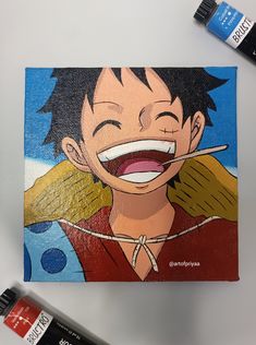 a painting of an anime character with a toothbrush in his mouth and some markers nearby