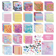 a large assortment of colorful papers and stickers