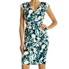 Alexia Admor Womens Green Floral Printed V-Neck Sheath Dress. Bold Floral Prints Cover This Sleeveless V-Neck Sheath Dress. (Pink, Green And White) - V-Neck - Sleeveless - Hidden Back Zip Closure - Banded Waist - Split Back - Floral Printed - Fully Lined. - Stretch Knit Brand New With Tags Attached. Size Medium. This Dress Is Gorgeous! It Just Doesn't Fit Me. Green Fitted V-neck Dress With Short Sleeves, Feminine Fitted Floral Print V-neck Dress, Fitted Green V-neck Dress For Work, Chic Green Fitted V-neck Dress, Fitted V-neck Dress With Floral Print And Notched Neckline, Green Fitted Short Sleeve V-neck Dress, Sheath V-neck Dress For Summer Workwear, Fitted Green V-neck Chic Dress, Elegant Green Floral Print V-neck Dress