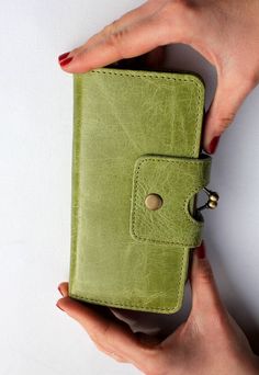 Our Odilynch Large Evanna Clip frame clasp closure wallet has a middle clip purse, width is 9.5cms, height is 18cms, width fully open is 19.5, kiss clip frame measures 15.5cms. This leather wallet is a perfect accessory to fit your cards, notes, coins and other essentials.  Perfect for everyday or formal event clutch Vintage Green Wallets With Card Slots, Classic Green Rectangular Coin Purse, Classic Green Wallets As Gift, Green Bifold Coin Purse For Everyday Use, Vintage Green Coin Purse For Everyday Use, Green Rectangular Wallets For Daily Use, Green Rectangular Coin Purse With Card Slots, Green Rectangular Coin Purse With Interior Card Slots, Green Clutch Wallet With Card Slots