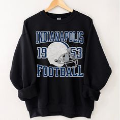 Perfect sweatshirt for Indianapolis football fans this season! Ideal for any situation, a unisex heavy blend crewneck sweatshirt is pure comfort. These garments are made from polyester and cotton. This combination helps designs come out looking fresh and beautiful. The collar is ribbed knit, so it retains its shape even after washing. There are no itchy side seams on these sweaters.  .: 50% cotton, 50% polyester .: Medium-heavy fabric (8.0 oz/yd² (271.25 g/m .: Loose fit .: Sewn-in label .: Runs Fleece Fan Apparel Sweatshirt, Crew Neck Hoodie With Team Logo, Fan Apparel Crew Neck Hoodie, Crew Neck Hoodie With Team Name, Crew Neck Hoodie For Fan Merchandise, Pre-shrunk Crew Neck Hoodie For Fan Gear, Football Season Fan Apparel Sweatshirt, Team Spirit Crew Neck Hoodie For Football Season, Football Fan Apparel Sweatshirt, Pre-shrunk