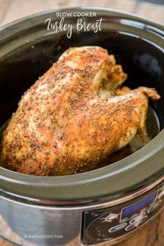 a close up of a chicken in a slow cooker