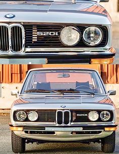 the front and side view of an old bmw